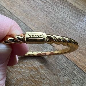 COACH gold twist bangle